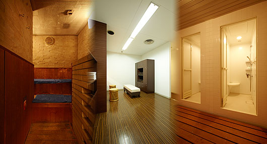 A sauna room with shower space